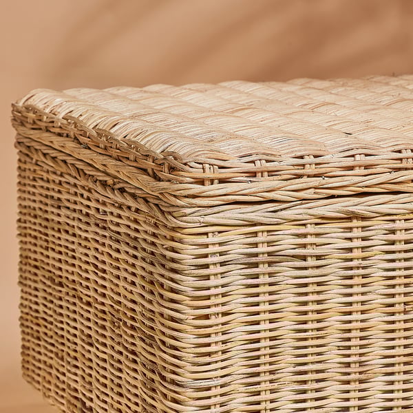 Handwoven rattan bench showcasing intricate texture and natural tones, highlighting its premium craftsmanship and durability.