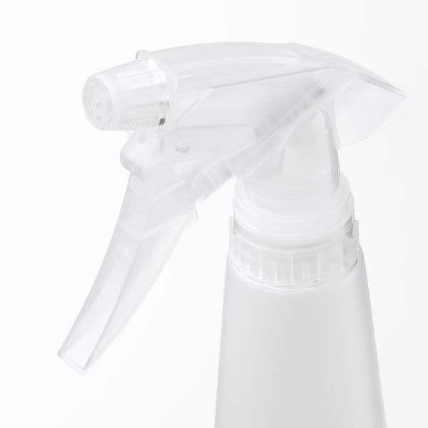 Clear spray bottle nozzle with adjustable spray settings, mounted on white container.