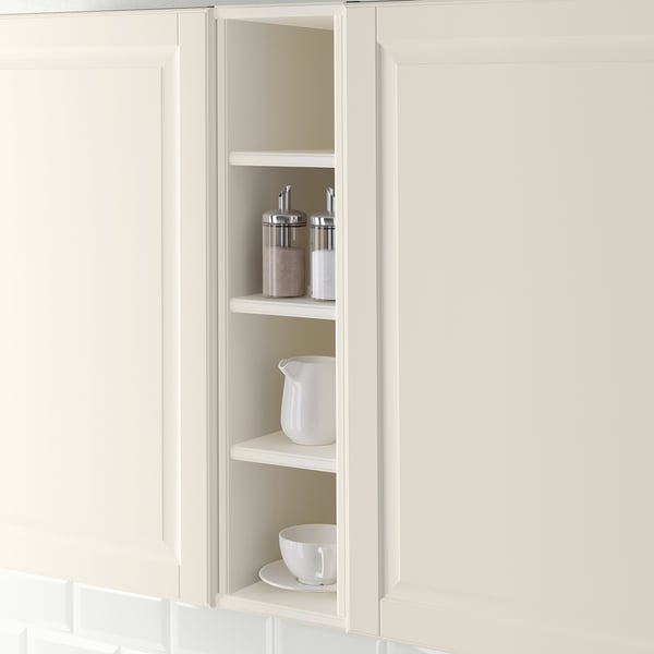 Open kitchen cabinet displaying items; part of the TORNVIKEN series for storage and display.