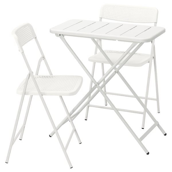 Product: TORPARÖ white outdoor table and chairs. Café-style; metal and plastic; foldable; modern design.