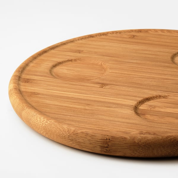 Round bamboo tray with smooth, even surface and gentle curves, showcasing quality craftsmanship.