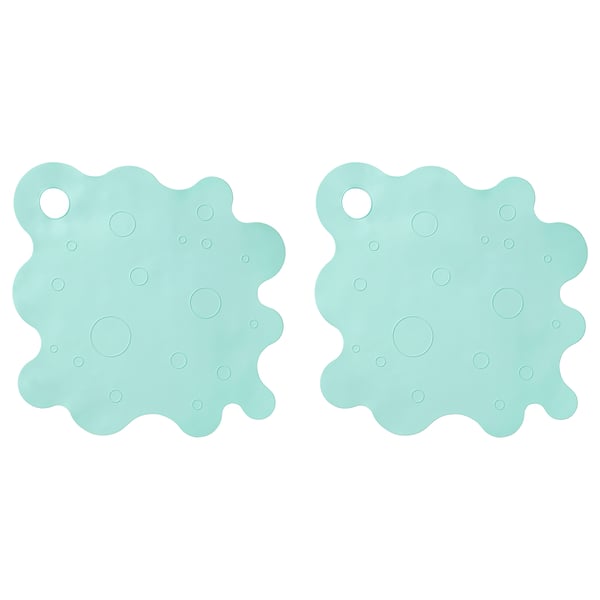 Two mint green, circular bath mats with suction cups and drain hole.