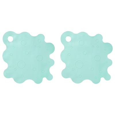 Two mint green, circular bath mats with suction cups and drain hole.