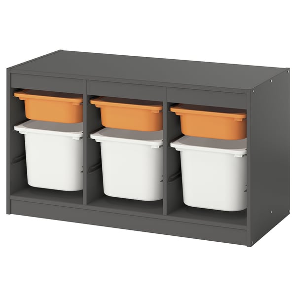 TROFAST grey storage unit, featuring orange and white bins, ideal for organising kids toys. Sturdy design with plastic bins in compartments.