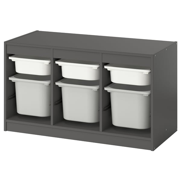 A TROFAST gray storage unit with white plastic bins, designed for children. It has a modern, organized look with adjustable compartments.