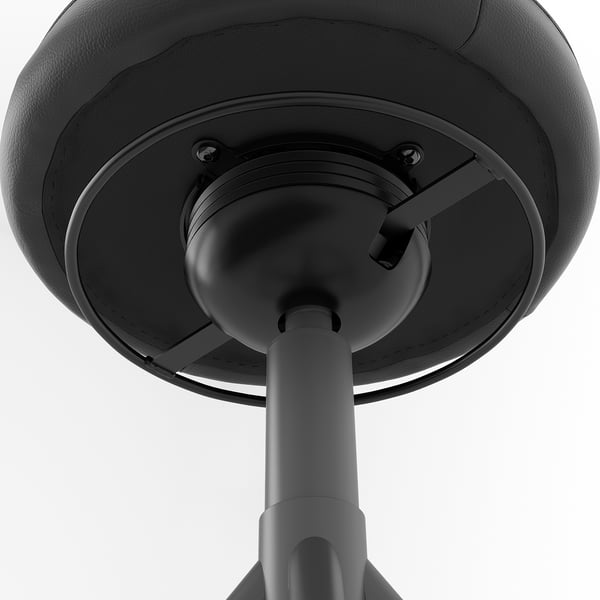 Black office chairs with circular base and stability enhancements.