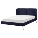 Displays a TUFJORD bedframe in blue, featuring a curved headboard and metal legs for a modern look.