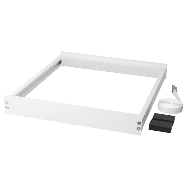 White TYKARP appliance stacking kit, steel frame with rubber pad, includes strap, ready to secure appliances.