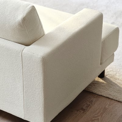 Beige UPPÅKRA sofa with plush cushions on wooden floors.
