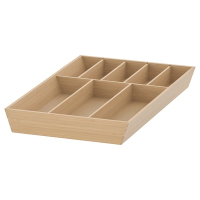 An UPPDATERA bamboo cutlery tray with six compartments. Light brown colour, organised shape for kitchen drawer organisation.