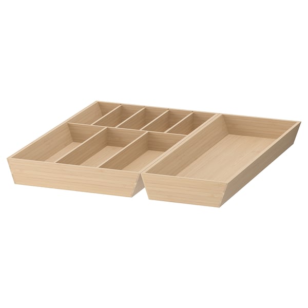 An updatera wooden drawer organizer in beige, featuring multiple compartments for storage.