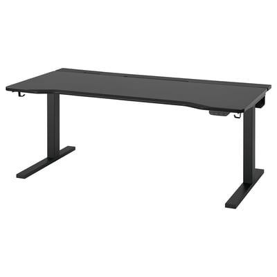 UTMANING black electric gaming desk, standing or sitting, large rectangular top, durable steel legs, sloped edge for comfort.