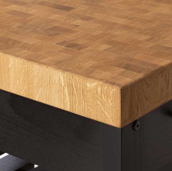 High-quality butcher block countertop with smooth, even finish. Crafted from solid wood, VADHOLMA is robust and polished, perfect for any kitchen.