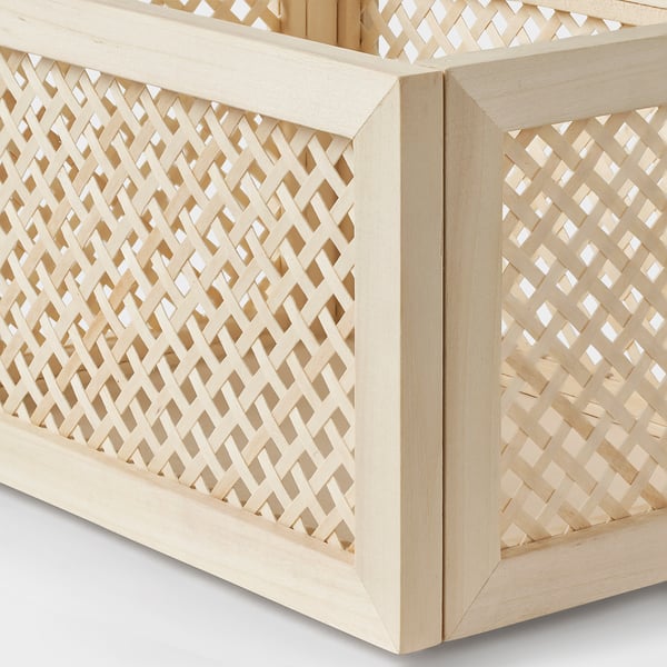 Handwoven light wood basket with intricate lattice pattern, crafted from poplar wood, showcasing fine craftsmanship and durability.