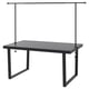 Black metal outdoor table with rectangular top, two horizontal bars above for decoration, square legs, suitable for parties.