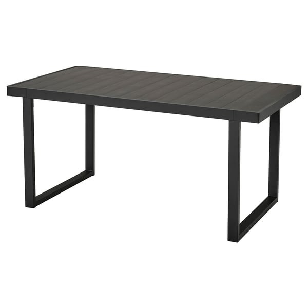 Rectangular VÄRMANSÖ outdoor table with black aluminium top and legs.