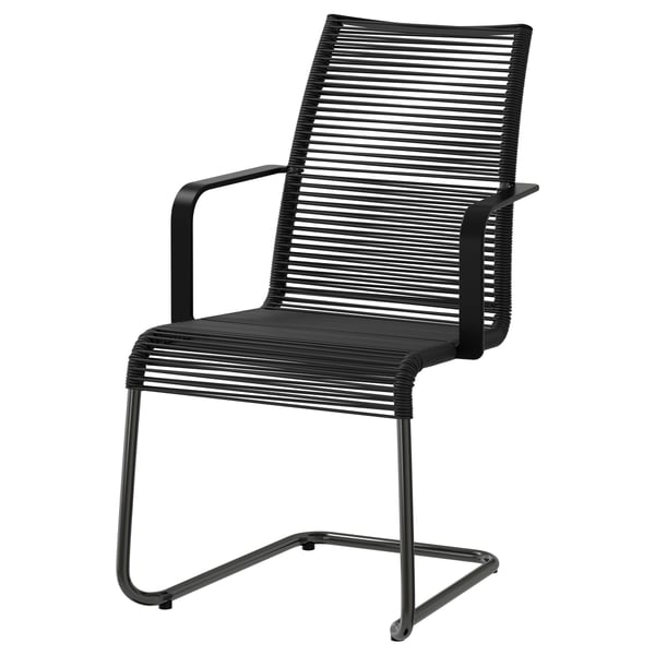 VÄSMAN black outdoor chair, sleek design, sturdy steel frame, comfortable spring seat.