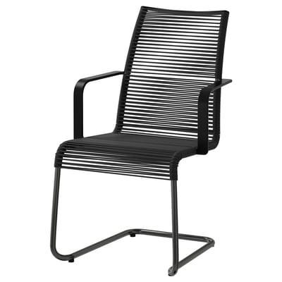 VÄSMAN black outdoor chair, sleek design, sturdy steel frame, comfortable spring seat.