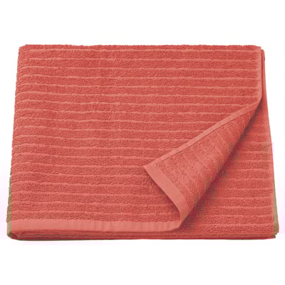 Bright orange VÅGSJÖN bath towel, rectangular, folded, with ribbed texture, made of 100% cotton.