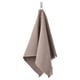 Textured, light grey-brown towel hangs neatly, with fringe edges; 80% cotton, 20% viscose.
