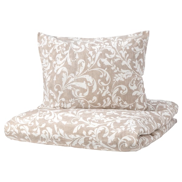VÅRBRÄCKA beige floral duvet cover and pillowcase set, 100% cotton with intricate scroll designs.