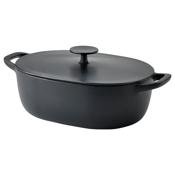 Black VARDAGEN cast iron casserole with handles and lid, ideal for slow cooking.