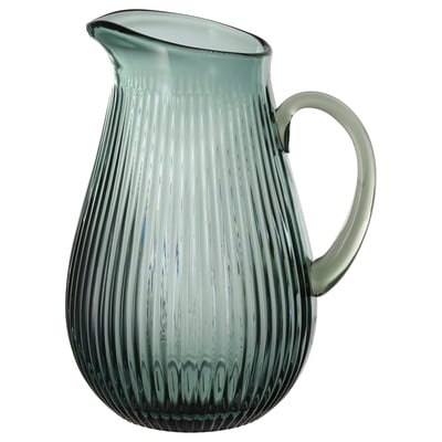 A VARDAGEN teal green glass pitcher with a ribbed texture. The shape is classic with a handle for easy pouring.