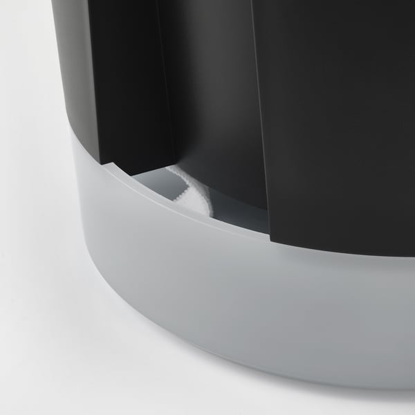 Modern minimalist self-watering planter, black with frosted grey base.