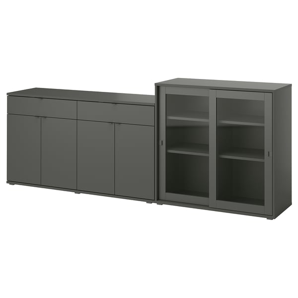 Two gray modern cabinets, one with sliding glass doors and shelves, the other with solid doors and drawers.