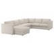 A VIMLE sectional sofa in beige, composed of multiple modules with a chaise lounge, offering versatile seating arrangement.