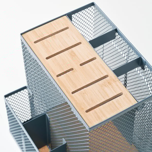 Modern, multi-compartment organiser with sleek bamboo top and metal mesh.
