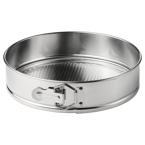 This image the VINTERROCKA springform baking pan. Its round, silver-colored, made of stainless steel, with a perforated base and spring locks.