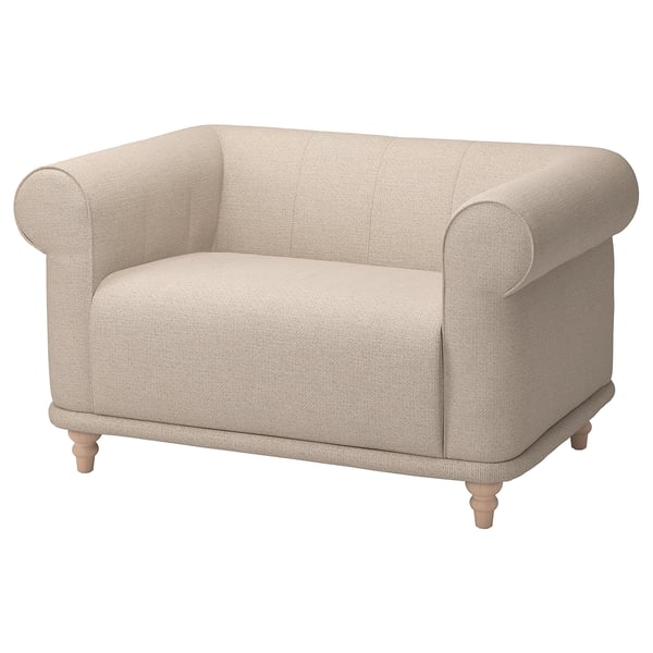 This image a VISKAFORS armchair, upholstered in beige fabric with rolled arms, a deep seat, and wooden legs.
