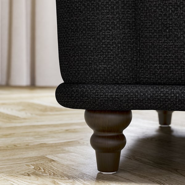 Black VISKAFORS sofa leg, round wooden design.