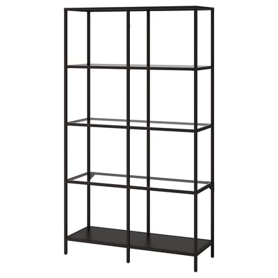 The VITTSJÖ shelf is a modern, black metal and glass storage unit with five transparent shelves.