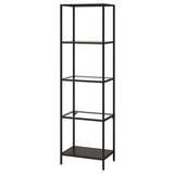 A VITTSJÖ black metal and glass bookshelf with four shelves. It has a sleek, modern design, perfect for displaying items.