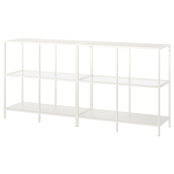 A VITTSJÖ white metal and glass storage shelf with three levels for display.