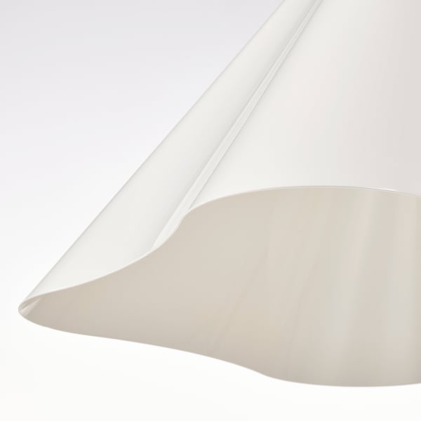 Elegant pendant lamp with sleek, curved design. Made from recycled plastic, showcasing smooth, even finish.