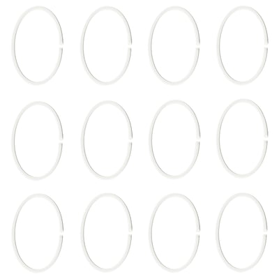 Divpadsmit baltas ovālas plastmasas stīpas, kas parādītas rindās.