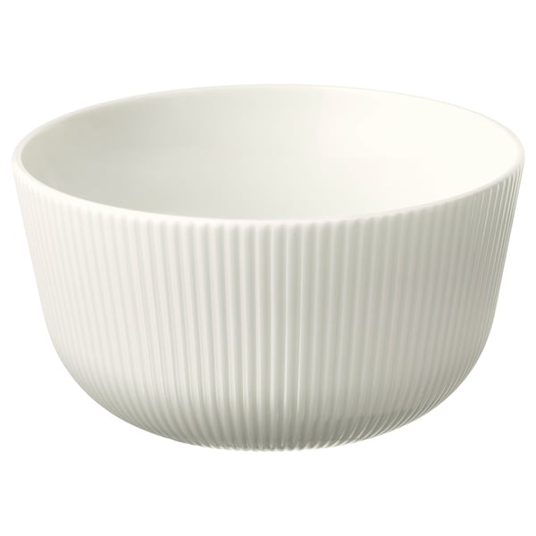 Balta OFANTLIGT keramikas bļoda, kas izgatavota no laukšpata porcelāna, ar vertikālu rievotu dizainu, kas nodrošina saķeri un estētisku pievilcību.