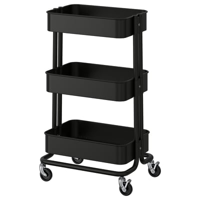 Ikea RÅSKOG, melns, trīspakāpju mobilais glabāšanas ratiņš ar slēdzamiem riteņiem, ideāli piemērots virtuves un galda lietošanai.