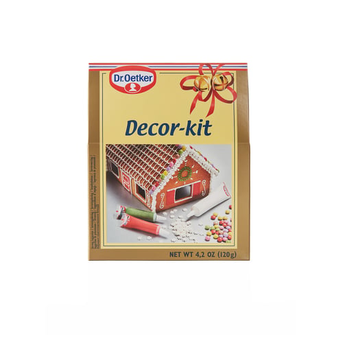Коробка для декоративных наборов Dr. Oetker. Показывает пряничный домик, трубочки для глазури, конфеты. Используется для выпечки.