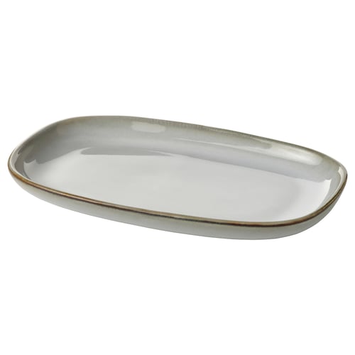 Овальная тарелка из керамогранита ручной работы с песочной глазурью.