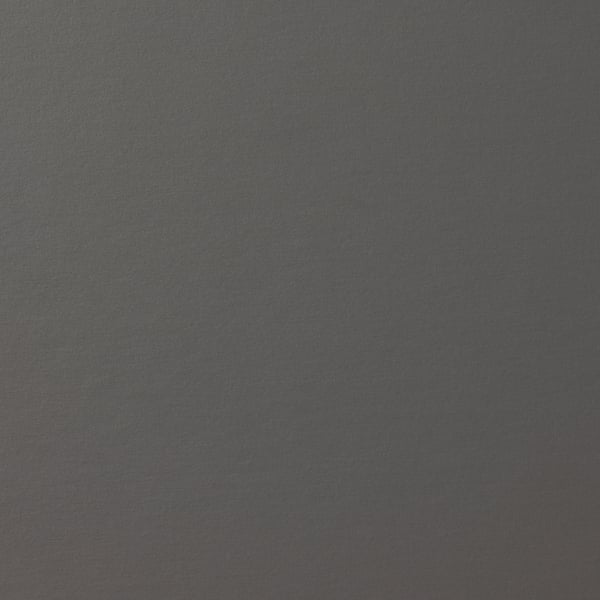 Мебель темных тонов с гладкой, гладкой текстурой поверхности. Выглядит прочным и хорошо сделанным.