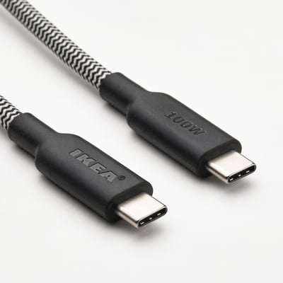 Черно-серый зарядный кабель usb-c с именем RUNDHULT, 1. Длиной 5 метров, с гибким резиновым соединителем и резинкой для хранения.
