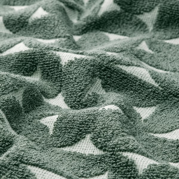 Soft, green patterned towel with textured weave, likely highly absorbent and comfortable.