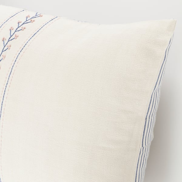 Hand-embroidered cotton cushion cover, cream with blue stripes and floral detail.
