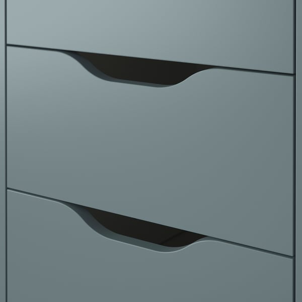 Grey drawer unit with smooth, modern finish and recessed handles. The drawers appear well-crafted and sturdy.