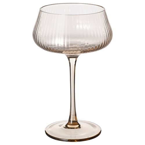A tall, clear glass champagne coupe with a wide bowl and long stem. The design is elegant and sophisticated, ideal for serving champagne.