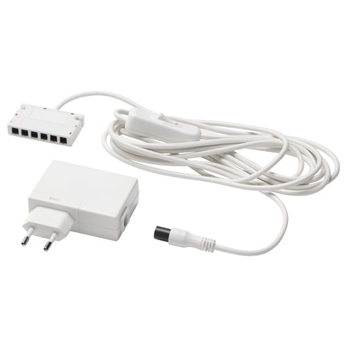 A white ANSLUTA power cord kit with a switch and adapter for controlling home lighting.